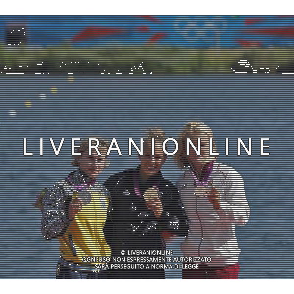 (120811) -- LONDON, Aug. 11, 2012 () -- Gold medalist Lisa Carrington of New Zealand (C), silver medalist Inna Osypenko-Radomska of Ukraine (L) and bronze medalist Natasa Douchev-Janics of Hungary attend victory ceremony of women\'s kayak single (K1) 200m competition of Canoe Sprint event, at London 2012 Olympic Games in London, Britain, on August 11, 2012. (/Shen Bohan) (nxl) ©PHOTOSHOT/Agenzia Aldo Liverani Sas - ITALY ONLY - GIOCHI OLIMPICI, OLIMPIADI LONDRA 2012