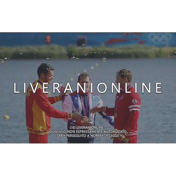 (120811) -- LONDON, Aug. 11, 2012 () -- Gold medalist Ed McKeever of Britain (C), silver medalist Saul Craviotto Rivero of Spain (L) and bronze medalist Mark de Jonge of Cananda attend victory ceremony of men\'s kayak single (K1) 200m competition of Canoe Sprint event, at London 2012 Olympic Games in London, Britain, on August 11, 2012. (/Shen Bohan) (nxl) ©PHOTOSHOT/Agenzia Aldo Liverani Sas - ITALY ONLY - GIOCHI OLIMPICI, OLIMPIADI LONDRA 2012