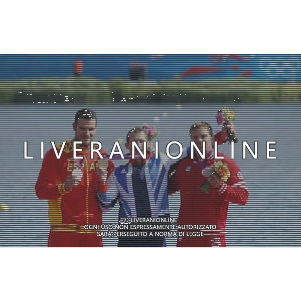 (120811) -- LONDON, Aug. 11, 2012 () -- Gold medalist Ed McKeever of Britain (C), silver medalist Saul Craviotto Rivero of Spain (L) and bronze medalist Mark de Jonge of Cananda attend victory ceremony of men\'s kayak single (K1) 200m competition of Canoe Sprint event, at London 2012 Olympic Games in London, Britain, on August 11, 2012. (/Shen Bohan) (nxl) ©PHOTOSHOT/Agenzia Aldo Liverani Sas - ITALY ONLY - GIOCHI OLIMPICI, OLIMPIADI LONDRA 2012