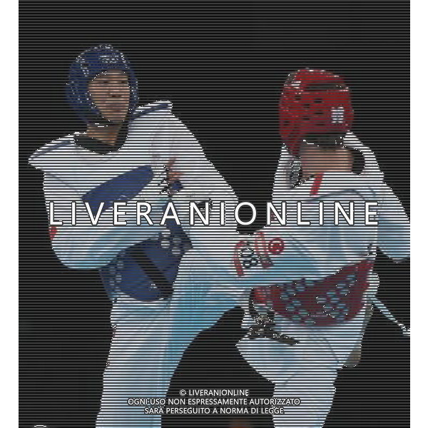 (120811) -- LONDON, Aug. 11, 2012 () -- Liu Xiaobo of China (blue) competes with Bahri Tanrikulu of Turkey during the bronze medal match of men\'s +80kg Taekwondo at London 2012 Olympic Games, London, Britain, Aug. 11, 2012. Liu Xiaobo of China won the match and claimed the bronze medal of the event. (/Wang Lili) ©PHOTOSHOT/Agenzia Aldo Liverani Sas - ITALY ONLY - GIOCHI OLIMPICI, OLIMPIADI LONDRA 2012