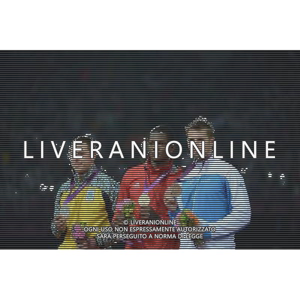 (120811) -- LONDON, Aug. 11, 2012 () -- Gold medalist Keshorn Walcott (C) of Trinidad and Tobago, silver medalist Oleksandr Pyataytsya (L) of Ukraine and bronze medalist Antti Ruuskanen of Finland pose at awarding ceremony of men\'s javelin throw event at London 2012 Olympic Games, London, Britain, Aug. 11, 2012. (/Wang Jianhua)(zgp) ©PHOTOSHOT/Agenzia Aldo Liverani Sas - ITALY ONLY - GIOCHI OLIMPICI, OLIMPIADI LONDRA 2012