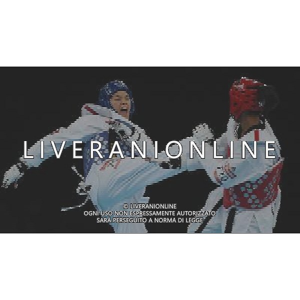 (120811) -- LONDON, Aug. 11, 2012 () -- Maria del Rosario of Mexico (blue) competes with Glenhis Hernandez of Cuba during the bronze medal match of women\'s +67kg Taekwondo at London 2012 Olympic Games, London, Britain, Aug. 11, 2012. Maria del Rosario of Mexico won the match and claimed the bronze medal of the event. (/Wang Lili) ©PHOTOSHOT/Agenzia Aldo Liverani Sas - ITALY ONLY - GIOCHI OLIMPICI, OLIMPIADI LONDRA 2012