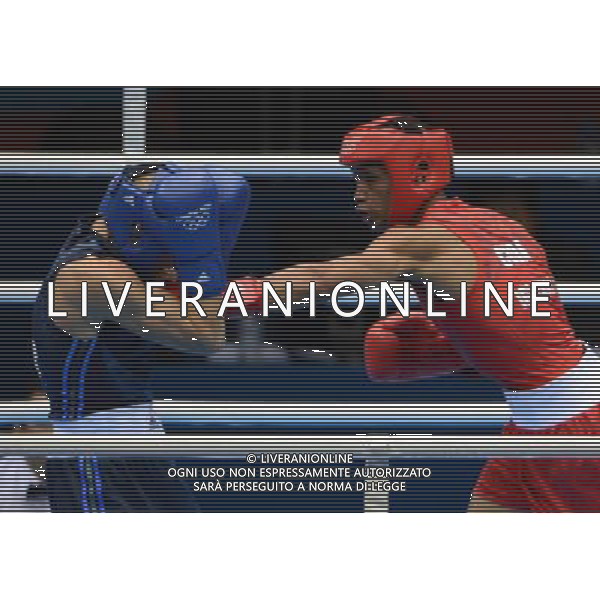 (120811) -- LONDON, Aug. 11, 2012 () -- Roniel Iglesias Sotolongo of Cuba (in red) competes with Denys Berinchyk of Ukraine during men\'s boxing light welter (64kg) gold medal match, at London 2012 Olympic Games in London, Britain, on August 11, 2012. Roniel Iglesias Sotolongo of Cuba won the gold medal of the event. (/Guo Yong) ©PHOTOSHOT/Agenzia Aldo Liverani Sas - ITALY ONLY - GIOCHI OLIMPICI, OLIMPIADI LONDRA 2012