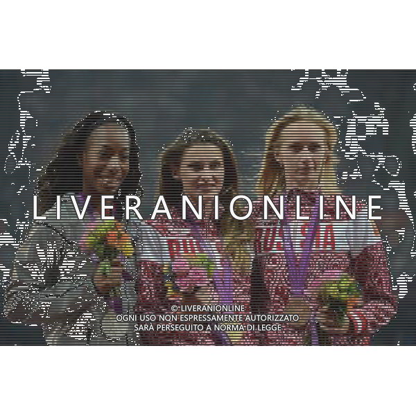 (120811) -- LONDON, Aug. 11, 2012 () -- Gold medalist Anna Chicherova (C) of Russia, silver medalist Brigetta Barrett (L) of USA, and bronze medalist Svetlana Shkolina of Russia pose at awarding ceremony of women\'s high jump event at London 2012 Olympic Games, London, Britain, Aug. 11, 2012. (/Wang Jianhua)(zgp) ©PHOTOSHOT/Agenzia Aldo Liverani Sas - ITALY ONLY - GIOCHI OLIMPICI, OLIMPIADI LONDRA 2012