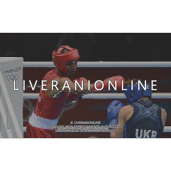 (120811) -- LONDON, Aug. 11, 2012 () -- Roniel Iglesias Sotolongo of Cuba (in red) competes with Denys Berinchyk of Ukraine during men\'s boxing light welter (64kg) gold medal match, at London 2012 Olympic Games in London, Britain, on August 11, 2012. Roniel Iglesias Sotolongo of Cuba won the gold medal of the event. (/Guo Yong) ©PHOTOSHOT/Agenzia Aldo Liverani Sas - ITALY ONLY - GIOCHI OLIMPICI, OLIMPIADI LONDRA 2012