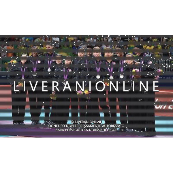 (120811) -- LONDON, Aug. 11, 2012 () -- American players celebrate during victory ceremony of women\'s volleyball competition, at London 2012 Olympic Games in London, Britain, on August 11, 2012. USA won silver medal. (/Wang Qingqin) (nxl) ©PHOTOSHOT/Agenzia Aldo Liverani Sas - ITALY ONLY - GIOCHI OLIMPICI, OLIMPIADI LONDRA 2012
