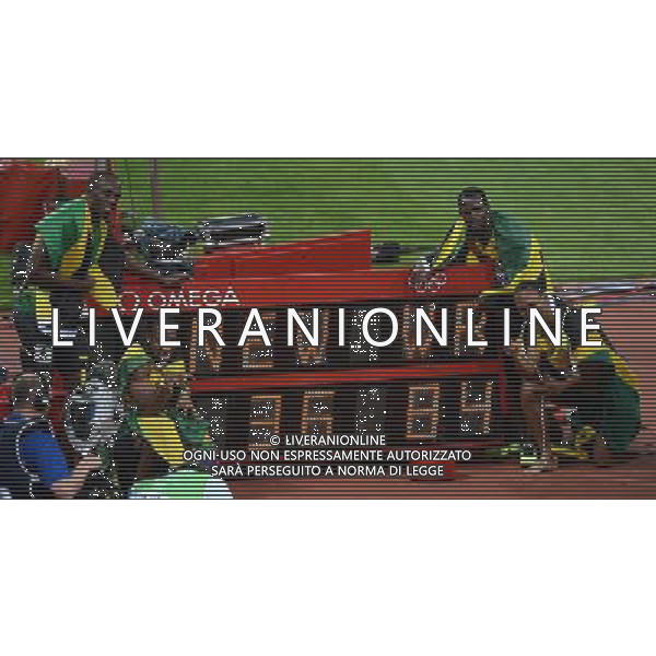 (120811) -- LONDON, Aug. 1, 2012 () -- Runners of Jamaica celebrate after men\'s 4x100m relay final at London 2012 Olympic Games, London, Britain, Aug. 11, 2012. The Jamaican team won gold medal with a new world record of 36.84. (/Li Gang)(zgp) ©PHOTOSHOT/Agenzia Aldo Liverani Sas - ITALY ONLY - GIOCHI OLIMPICI, OLIMPIADI LONDRA 2012