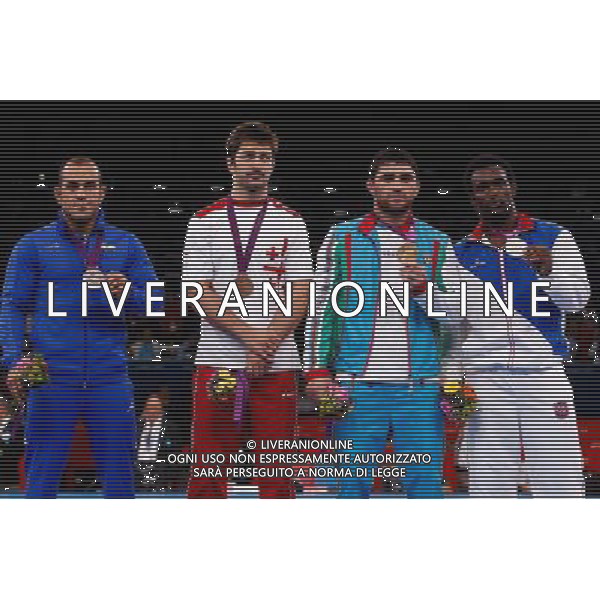 (120811) -- LONDON, Aug. 11, 2012 () -- Gold medalist Sharif Sharifov of Azerbaijan (2nd R), silver medalist Jaime Yusept Espinal of Puerto Rico (1st R), bronze medalists Dato Marsagishvili of Georgia (2nd R) and Ehsan Naser Lashgari of Iran attend victory ceremony of men\'s freestyle wrestling 84kg contest, at London 2012 Olympic Games in London, Britain, on August 11, 2012. (/Jin Liwang) (nxl) ©PHOTOSHOT/Agenzia Aldo Liverani Sas - ITALY ONLY - GIOCHI OLIMPICI, OLIMPIADI LONDRA 2012