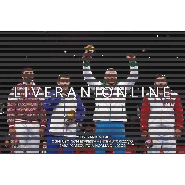 (120811) -- LONDON, Aug. 11, 2012 () -- Gold medalist Artur Taymazov of Uzbekistan (2nd R), silver medalist Davit Modzmanashvili of Georgia (1st R) and bronze medalists Komeil Ghasemi of Iran (2nd L) and Bilyal Makhov of Russia attend victory ceremony of men\'s wrestling freestyle 120kg contest, at London 2012 Olympic Games in London, Britain, on August 11, 2012. (/Jin Liwang) (nxl) ©PHOTOSHOT/Agenzia Aldo Liverani Sas - ITALY ONLY - GIOCHI OLIMPICI, OLIMPIADI LONDRA 2012