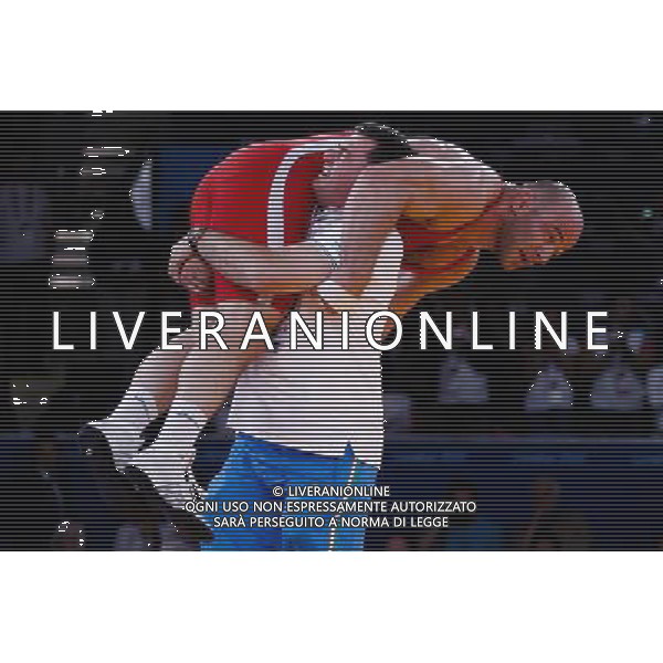 (120811) -- LONDON, Aug. 11, 2012 () -- Artur Taymazov of Uzbekistan (in red) celebrates after defeating Davit Modzmanashvili of Georgia in men\'s wrestling freestyle 120kg gold medal contest, at London 2012 Olympic Games in London, Britain, on August 11, 2012. Artur Taymazov of Uzbekistan won gold medal. (/Jin Liwang) (nxl) ©PHOTOSHOT/Agenzia Aldo Liverani Sas - ITALY ONLY - GIOCHI OLIMPICI, OLIMPIADI LONDRA 2012