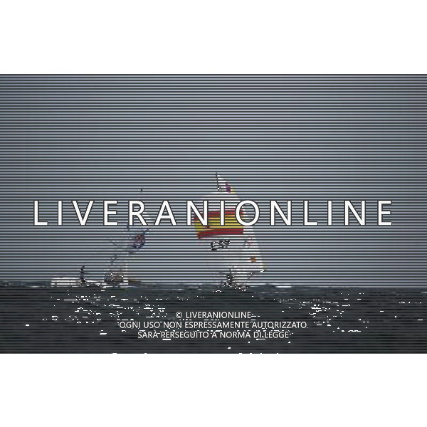 (120811) -- LONDON, Aug. 11, 2012 () -- The Spanish team (R) competes with the Australian team during Elliott 6m WMR competition of Sailing event, at London 2012 Olympic Games in Britain, on August 11, 2012. The Spanish team won gold medal. The Australian team won silver. (/Fei Maohua) (nxl) ©PHOTOSHOT/Agenzia Aldo Liverani Sas - ITALY ONLY - GIOCHI OLIMPICI, OLIMPIADI LONDRA 2012