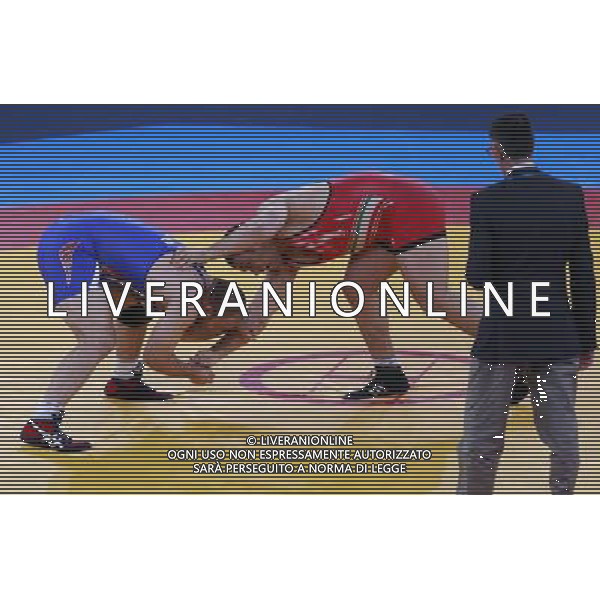 (120811) -- LONDON, Aug. 11, 2012 () -- Komeil Ghasemi of Iran (red) competes with Tervel Ivaylov Dlagnev of the United States during the Men\'s 120kg Freestyle bronze medal match of Wrestling at London 2012 Olympic Games, London, Britain, Aug. 11, 2012. Komeil Ghasemi of Iran won the match and claimed the bronze medal of the event. (/Ren Zhenglai) ©PHOTOSHOT/Agenzia Aldo Liverani Sas - ITALY ONLY - GIOCHI OLIMPICI, OLIMPIADI LONDRA 2012