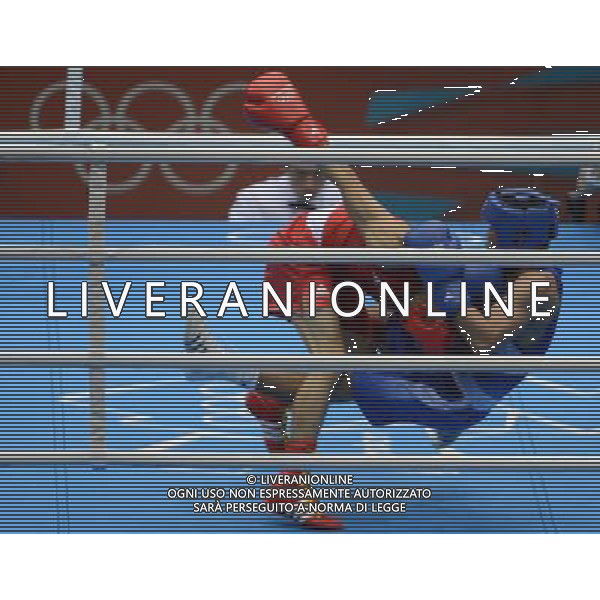 (120811) -- LONDON, Aug. 11, 2012 () -- Zhou Shiming of China (in red) competes with Kaeo Pongprayoon of Thailand during men\'s boxing light fly (49kg) gold medal match, at London 2012 Olympic Games in London, Britain, on August 11, 2012. Zhou Shiming of China defeated Kaeo Pongprayoon of Thailand. (/Li Ga) (nxl) ©PHOTOSHOT/Agenzia Aldo Liverani Sas - ITALY ONLY - GIOCHI OLIMPICI, OLIMPIADI LONDRA 2012