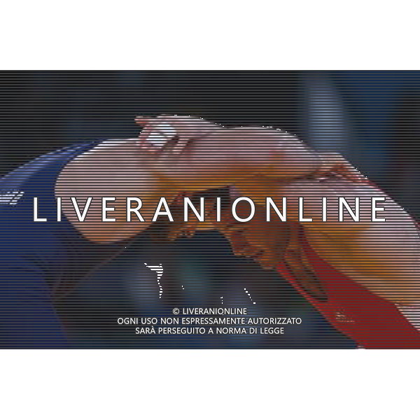 (120811) -- LONDON, Aug. 11, 2012 () -- Artur Taymazov of Uzbekistan (red) competes with Davit Modzmanashvili of Georgia during the Men\'s 120kg Freestyle gold medal match of Wrestling at London 2012 Olympic Games, London, Britain, Aug. 11, 2012. Artur Taymazov of Uzbekistan won the match and claimed the gold medal of the event. (/Jin Liwang) ©PHOTOSHOT/Agenzia Aldo Liverani Sas - ITALY ONLY - GIOCHI OLIMPICI, OLIMPIADI LONDRA 2012