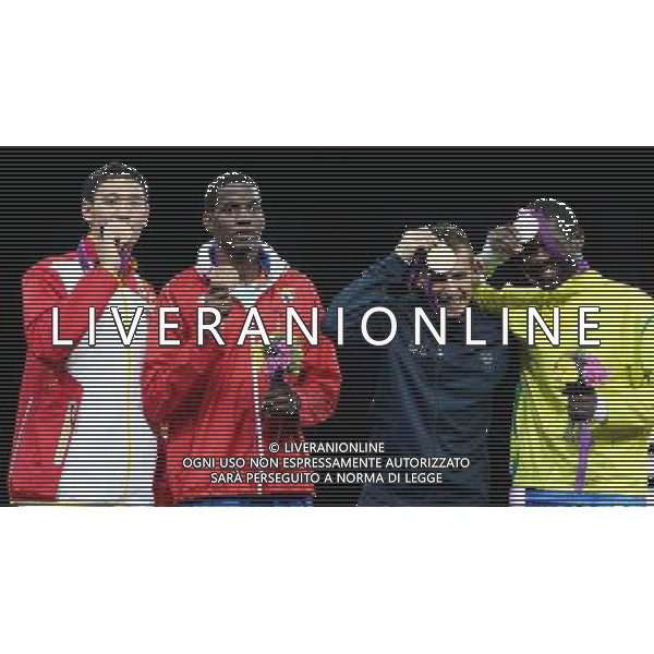 (120811) -- LONDON, Aug. 11, 2012 () -- Gold medalist Carlo Molfetta of Italy (2nd R), silver medalist Anthony Obame of Gabon (1st R), bronze medalists Robelis Despaigne of Cuba (2nd L) and Liu Xiaobo of China pose at the awarding ceremony of men\'s +80kg Taekwondo at London 2012 Olympic Games, London, Britain, Aug. 11, 2012. (/Wang Lili) ©PHOTOSHOT/Agenzia Aldo Liverani Sas - ITALY ONLY - GIOCHI OLIMPICI, OLIMPIADI LONDRA 2012