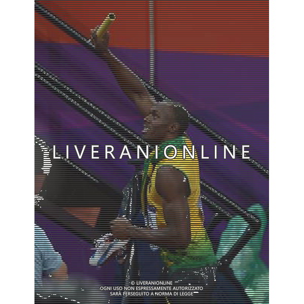 (120811) -- LONDON, Aug. 1, 2012 () -- Usain Bolt of Jamaica celebrates after men\'s 4x100m relay final at London 2012 Olympic Games, London, Britain, Aug. 11, 2012. The Jamaican team won gold medal with a new world record of 36.84. (/Li Gang)(zgp) ©PHOTOSHOT/Agenzia Aldo Liverani Sas - ITALY ONLY - GIOCHI OLIMPICI, OLIMPIADI LONDRA 2012