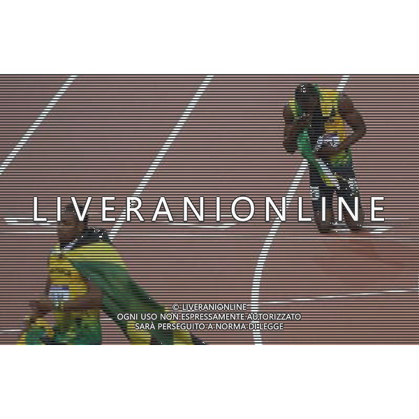 (120811) -- LONDON, Aug. 1, 2012 () -- Usain Bolt (R) of Jamaica celebrates after men\'s 4x100m relay final at London 2012 Olympic Games, London, Britain, Aug. 11, 2012. The Jamaican team won gold medal with a new world record of 36.84. (/Li Gang)(zgp) ©PHOTOSHOT/Agenzia Aldo Liverani Sas - ITALY ONLY - GIOCHI OLIMPICI, OLIMPIADI LONDRA 2012
