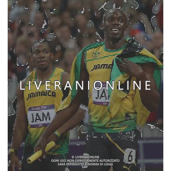 (120811) -- LONDON, Aug. 1, 2012 () -- Usain Bolt (R) of Jamaica celebrates after men\'s 4x100m relay final at London 2012 Olympic Games, London, Britain, Aug. 11, 2012. The Jamaican team won gold medal with a new world record of 36.84. (/Liao Yujie)(zgp) ©PHOTOSHOT/Agenzia Aldo Liverani Sas - ITALY ONLY - GIOCHI OLIMPICI, OLIMPIADI LONDRA 2012
