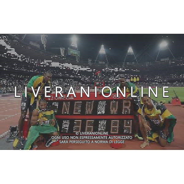 (120811) -- LONDON, Aug. 1, 2012 () -- Usain Bolt£ÂYohan Blake, Nesta Carter, and Michael Frater (from L to R) of Jamaica celebrate after men\'s 4x100m relay final at London 2012 Olympic Games, London, Britain, Aug. 11, 2012. The Jamaican team won gold medal with a new world record of 36.84. (/Liao Yujie)(zgp) ©PHOTOSHOT/Agenzia Aldo Liverani Sas - ITALY ONLY - GIOCHI OLIMPICI, OLIMPIADI LONDRA 2012
