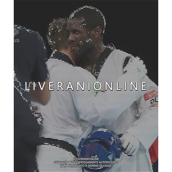 (120811) -- LONDON, Aug. 11, 2012 () -- Carlo Molfetta of Italy (red) hugs Anthony Obame of Gabon after the gold medal match of men\'s +80kg Taekwondo at London 2012 Olympic Games, London, Britain, Aug. 11, 2012. Carlo Molfetta of Italy won the match and claimed the gold medal of the event. (/Wang Lili) ©PHOTOSHOT/Agenzia Aldo Liverani Sas - ITALY ONLY - GIOCHI OLIMPICI, OLIMPIADI LONDRA 2012