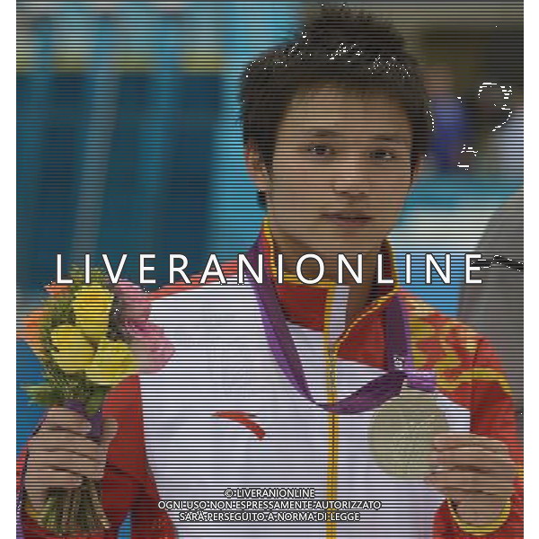 (120811) -- LONDON, Aug. 11, 2012 () -- China\'s Qiu Bo poses at awarding ceremony of men\'s 10m platform at London 2012 Olympic Games, London, Britain, Aug. 11, 2012. Qiu Bo won silver medal of the event. (/Yang Lei)(zgp) ©PHOTOSHOT/Agenzia Aldo Liverani Sas - ITALY ONLY - GIOCHI OLIMPICI, OLIMPIADI LONDRA 2012