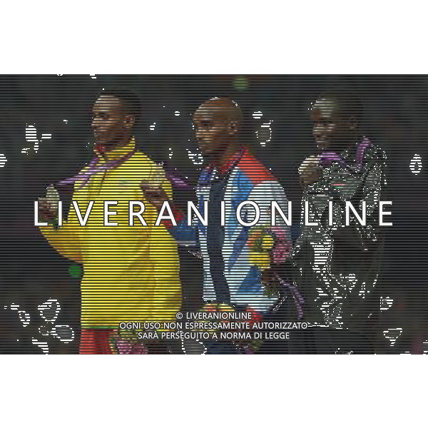 (120811) -- LONDON, Aug. 11, 2012 () -- Gold medalist Mohamed Farah (C) of Britain, silver medalist Dejen Gebremeskel (L) of Ethiopia, and bronze medalist Thomas Pkemei Longosiwa of Kenya pose at awarding ceremony of men\'s 5000m event at London 2012 Olympic Games, London, Britain, Aug. 11, 2012. (/Wang Jianhua)(zgp) ©PHOTOSHOT/Agenzia Aldo Liverani Sas - ITALY ONLY - GIOCHI OLIMPICI, OLIMPIADI LONDRA 2012