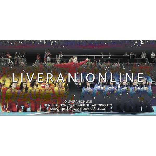 (120811) -- LONDON, Aug. 11, 2012 () -- A player of Montenegro (red) jumps at awarding ceremony of women\'s handball event, at London 2012 Olympic Games in London, Britain, on August 11, 2012. (/Wu Xiaoling) (zgp) ©PHOTOSHOT/Agenzia Aldo Liverani Sas - ITALY ONLY - GIOCHI OLIMPICI, OLIMPIADI LONDRA 2012