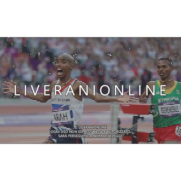 (120811) -- LONDON, Aug. 11, 2012 () -- Mohamed Farah (L) of Britain celebrates after men\'s 5000m final at London 2012 Olympic Games, London, Britain, Aug. 11, 2012. Mohamed Farah won gold medal with 13:41.66. (/Liao Yujie)(zgp) ©PHOTOSHOT/Agenzia Aldo Liverani Sas - ITALY ONLY - GIOCHI OLIMPICI, OLIMPIADI LONDRA 2012