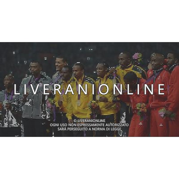 (120811) -- LONDON, Aug. 1, 2012 () -- Gold medalists of Jamaica, silver medalists of USA, and bronze medalists of Trinidad and Tobago pose at awarding ceremony of men\'s 4x100m relay event at London 2012 Olympic Games, London, Britain, Aug. 11, 2012. The Jamaican team won gold medal with a new world record of 36.84. (/Wang Jianhua)(zgp) ©PHOTOSHOT/Agenzia Aldo Liverani Sas - ITALY ONLY - GIOCHI OLIMPICI, OLIMPIADI LONDRA 2012