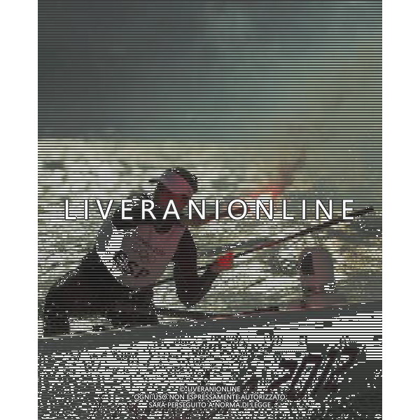 11.08.2012. Weymouth, Dorset, England. A Member of The Spanish team Celebrates by lighting a flare After Winning in Elliott 6m Competition of sailing Event London 2012 Olympic Games The Spanish team Won Gold Medal ©PHOTOSHOT/Agenzia Aldo Liverani Sas - ITALY ONLY - GIOCHI OLIMPICI, OLIMPIADI LONDRA 2012