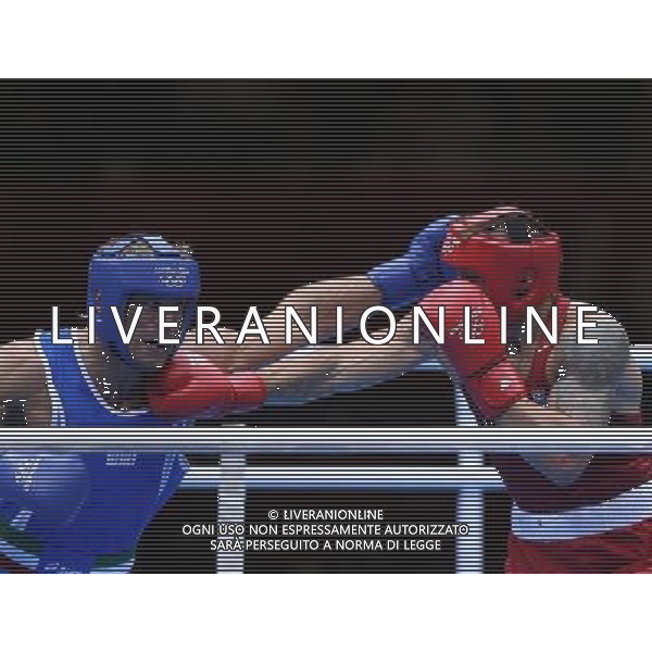 (120811) -- LONDON, Aug. 11, 2012 () -- Oleksandr Usyk of Ukraine (in red) competes with Clemente Russo of Italy during men\'s boxing heavy (91kg) gold medal match, at London 2012 Olympic Games in London, Britain, on August 11, 2012. Oleksandr Usyk of Ukraine won the gold medal of the event. (/Wang Shen) ©PHOTOSHOT/Agenzia Aldo Liverani Sas - ITALY ONLY - GIOCHI OLIMPICI, OLIMPIADI LONDRA 2012