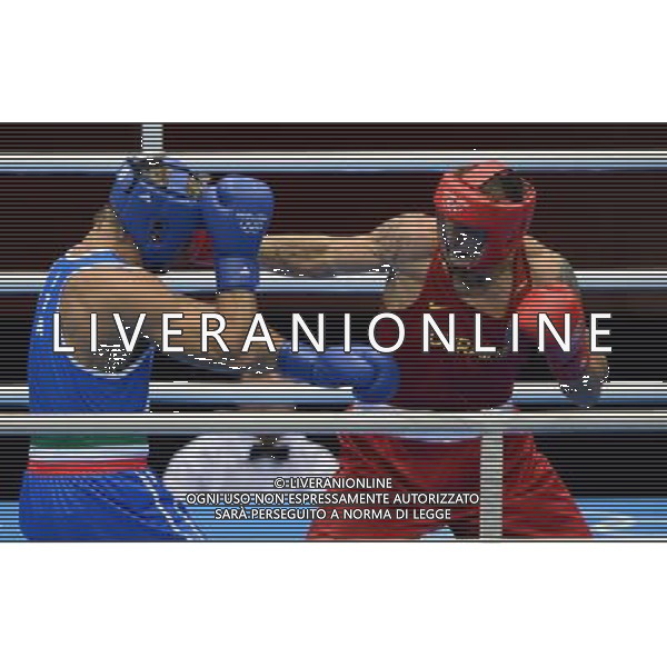 (120811) -- LONDON, Aug. 11, 2012 () -- Oleksandr Usyk of Ukraine (in red) competes with Clemente Russo of Italy during men\'s boxing heavy (91kg) gold medal match, at London 2012 Olympic Games in London, Britain, on August 11, 2012. Oleksandr Usyk of Ukraine won the gold medal of the event. (/Guo Yong) ©PHOTOSHOT/Agenzia Aldo Liverani Sas - ITALY ONLY - GIOCHI OLIMPICI, OLIMPIADI LONDRA 2012