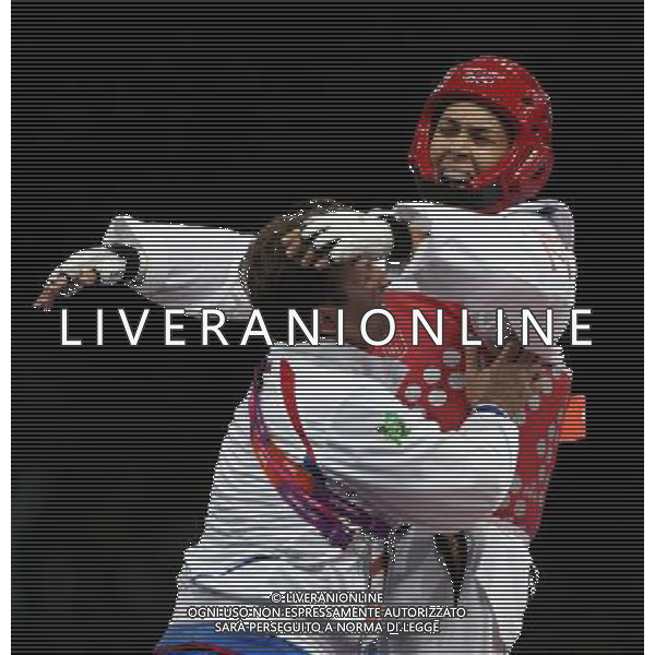 (120811) -- LONDON, Aug. 11, 2012 () -- Milica Mandic of Serbia (red) celebrates after winning over Anne-Caroline Graffe of France during the gold medal match of women\'s +67kg Taekwondo at London 2012 Olympic Games, London, Britain, Aug. 11, 2012. Milica Mandic of Serbia won the match and claimed the gold medal of the event. (/Wang Lili) ©PHOTOSHOT/Agenzia Aldo Liverani Sas - ITALY ONLY - GIOCHI OLIMPICI, OLIMPIADI LONDRA 2012