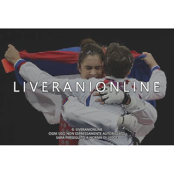 (120811) -- LONDON, Aug. 11, 2012 () -- Milica Mandic of Serbia (red) celebrates after winning over Anne-Caroline Graffe of France during the gold medal match of women\'s +67kg Taekwondo at London 2012 Olympic Games, London, Britain, Aug. 11, 2012. Milica Mandic of Serbia won the match and claimed the gold medal of the event. (/Wang Lili) ©PHOTOSHOT/Agenzia Aldo Liverani Sas - ITALY ONLY - GIOCHI OLIMPICI, OLIMPIADI LONDRA 2012