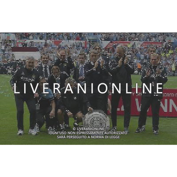 The Manchester City backroom staff celebrate with the trophy Football Friendly - FA Community Shield - Chelsea v Manchester City - Sunday 12th August 2012 - Villa Park - Birmingham å© CameraSport - 43 Linden Ave. Countesthorpe. Leicester. England. LE8 5PG - Tel: +44 (0) 116 277 4147 - admin@camerasport.com - www.camerasport.com AG ALDO LIVERANI S A S ONLY ITALY