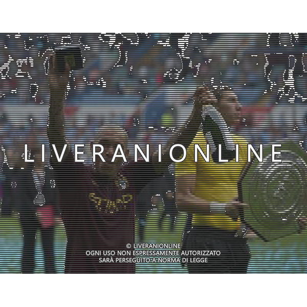 Manchester City\'s Nigel de Jong celebrates his teams victory Football Friendly - FA Community Shield - Chelsea v Manchester City - Sunday 12th August 2012 - Villa Park - Birmingham å© CameraSport - 43 Linden Ave. Countesthorpe. Leicester. England. LE8 5PG - Tel: +44 (0) 116 277 4147 - admin@camerasport.com - www.camerasport.com AG ALDO LIVERANI S A S ONLY ITALY