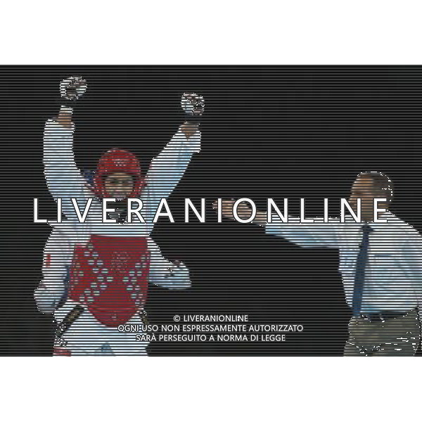 (120811) -- LONDON, Aug. 11, 2012 () -- Milica Mandic of Serbia (red) celebrates after winning over Anne-Caroline Graffe of France during the gold medal match of women\'s +67kg Taekwondo at London 2012 Olympic Games, London, Britain, Aug. 11, 2012. Milica Mandic of Serbia won the match and claimed the gold medal of the event. (/Wang Lili) ©PHOTOSHOT/Agenzia Aldo Liverani Sas - ITALY ONLY - GIOCHI OLIMPICI, OLIMPIADI LONDRA 2012