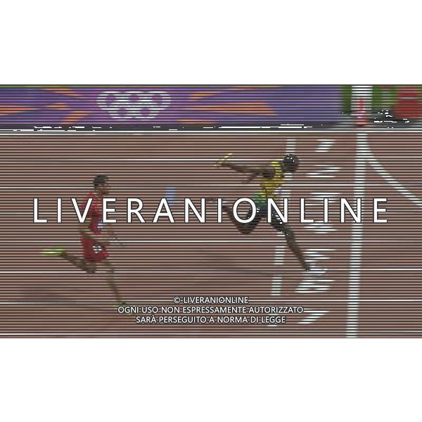 (120811) -- LONDON, Aug. 1, 2012 () -- Usain Bolt (R) of Jamaica runs across finish line in men\'s 4x100m relay final at London 2012 Olympic Games, London, Britain, Aug. 11, 2012. The Jamaican team won gold medal with a new world record of 36.84. (/Qi Heng)(zgp) ©PHOTOSHOT/Agenzia Aldo Liverani Sas - ITALY ONLY - GIOCHI OLIMPICI, OLIMPIADI LONDRA 2012