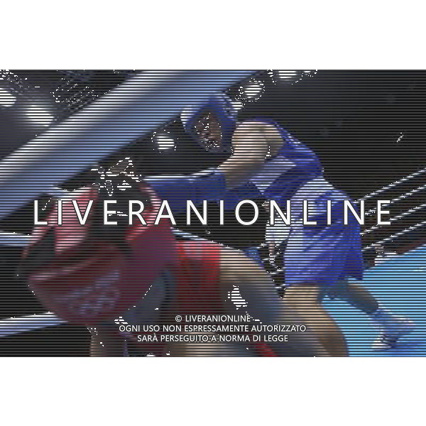 (120811) -- LONDON, Aug. 11, 2012 () -- Zhou Shiming of China (in red) competes with Kaeo Pongprayoon of Thailand during men\'s boxing light fly (49kg) gold medal match, at London 2012 Olympic Games in London, Britain, on August 11, 2012. Zhou Shiming of China defeated Kaeo Pongprayoon of Thailand. (/Wang Shen) (nxl) ©PHOTOSHOT/Agenzia Aldo Liverani Sas - ITALY ONLY - GIOCHI OLIMPICI, OLIMPIADI LONDRA 2012