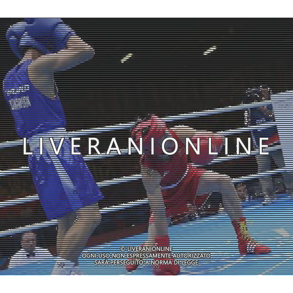 (120811) -- LONDON, Aug. 11, 2012 () -- Zhou Shiming of China (in red) competes with Kaeo Pongprayoon of Thailand during men\'s boxing light fly (49kg) gold medal match, at London 2012 Olympic Games in London, Britain, on August 11, 2012. Zhou Shiming of China defeated Kaeo Pongprayoon of Thailand. (/Wang Shen) (nxl) ©PHOTOSHOT/Agenzia Aldo Liverani Sas - ITALY ONLY - GIOCHI OLIMPICI, OLIMPIADI LONDRA 2012