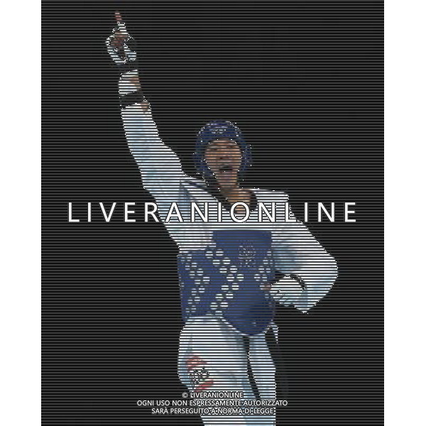 (120811) -- LONDON, Aug. 11, 2012 () -- Liu Xiaobo of China (blue) celebrates after winning over Bahri Tanrikulu of Turkey during the bronze medal match of men\'s +80kg Taekwondo at London 2012 Olympic Games, London, Britain, Aug. 11, 2012. Liu Xiaobo of China won the match and claimed the bronze medal of the event. (/Wang Lili) ©PHOTOSHOT/Agenzia Aldo Liverani Sas - ITALY ONLY - GIOCHI OLIMPICI, OLIMPIADI LONDRA 2012