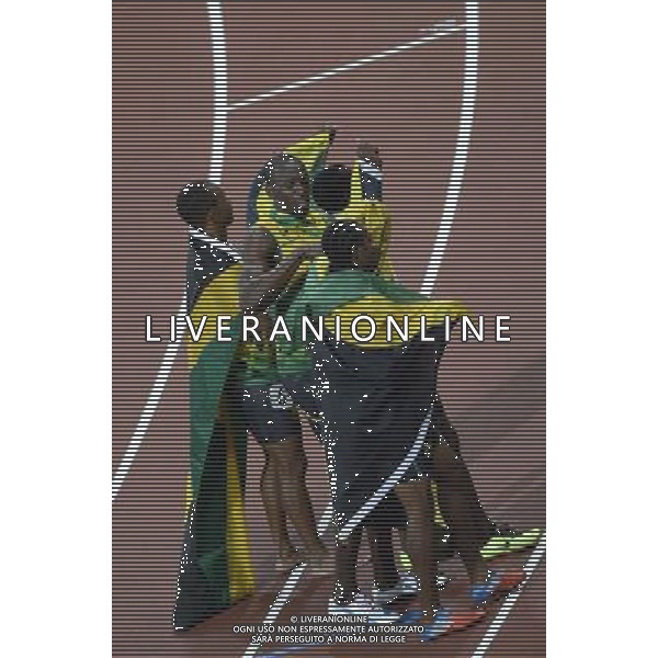 (120811) -- LONDON, Aug. 1, 2012 () -- Runners of Jamaica celebrate after men\'s 4x100m relay final at London 2012 Olympic Games, London, Britain, Aug. 11, 2012. The Jamaican team won gold medal with a new world record of 36.84. (/Qi Heng)(zgp) ©PHOTOSHOT/Agenzia Aldo Liverani Sas - ITALY ONLY - GIOCHI OLIMPICI, OLIMPIADI LONDRA 2012