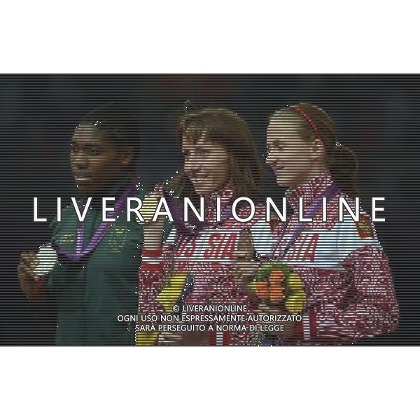 (120811) -- LONDON, Aug. 11, 2012 () -- Gold medalist Mariya Savinova (C) of Russia, silver medalist Caster Semenya (L) of South Africa, bronze medalist Ekaterina Poistogova of Russia pose at awarding ceremony of women\'s 800m event at London 2012 Olympic Games, London, Britain, Aug. 11, 2012. (/Wang Jianhua)(zgp) ©PHOTOSHOT/Agenzia Aldo Liverani Sas - ITALY ONLY - GIOCHI OLIMPICI, OLIMPIADI LONDRA 2012