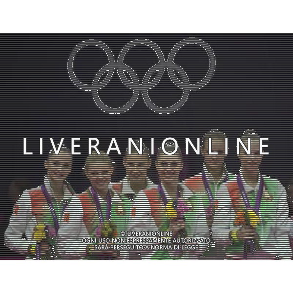 (120812) -- LONDON, Aug. 12, 2012 () -- The Belarusian team celebrate during victory ceremony of Group All-Around competition of Gymnastics Rhythmic event, at London 2012 Olympic Games in London, Britain, on August 12, 2012. Belarus won silver medal. (/Fei Maohua) (nxl) ©photoshot/Agenzia Aldo Liverani Sas - ITALY ONLY - GIOCHI OLIMPICI, OLIMPIADI LONDRA 2012