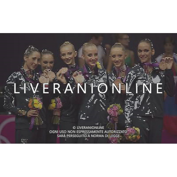 (120812) -- LONDON, Aug. 12, 2012 () -- The Italian team celebrate during victory ceremony of Group All-Around competition of Gymnastics Rhythmic event, at London 2012 Olympic Games in London, Britain, on August 12, 2012. Italy won bronze medal. (/Fei Maohua) (nxl) ©photoshot/Agenzia Aldo Liverani Sas - ITALY ONLY - GIOCHI OLIMPICI, OLIMPIADI LONDRA 2012