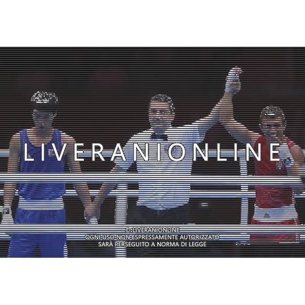 (120812) -- LONDON, Aug. 12, 2012 () -- Vasyl Lomachenko of Ukraine (in red) celebrates after defeating Han Soonchul of South Korea in men\'s boxing light (60kg) gold medal contest, at London 2012 Olympic Games in London, Britain, on August 12, 2012. Vasyl Lomachenko of Ukraine won gold medal. (/Wang Shen) (nxl) ©photoshot/Agenzia Aldo Liverani Sas - ITALY ONLY - GIOCHI OLIMPICI, OLIMPIADI LONDRA 2012