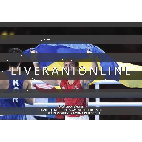 (120812) -- LONDON, Aug. 12, 2012 () -- Vasyl Lomachenko of Ukraine (in red) celebrates after defeating Han Soonchul of South Korea in men\'s boxing light (60kg) gold medal contest, at London 2012 Olympic Games in London, Britain, on August 12, 2012. Vasyl Lomachenko of Ukraine won gold medal. (/Wang Shen) (nxl) ©photoshot/Agenzia Aldo Liverani Sas - ITALY ONLY - GIOCHI OLIMPICI, OLIMPIADI LONDRA 2012