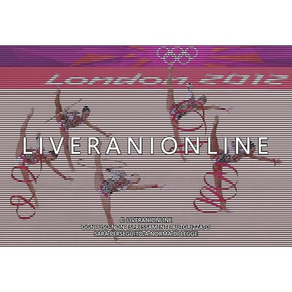 (120812) -- LONDON, Aug. 12, 2012 () -- The Italian team performs during the Group All-Around competition of Gymnastics Rhythmic event, at London 2012 Olympic Games in London, Britain, on August 12, 2012. Italy won bronze medal. (/Chen Jianli) (nxl) ITALY ONLY - GIOCHI OLIMPICI, OLIMPIADI LONDRA 2012