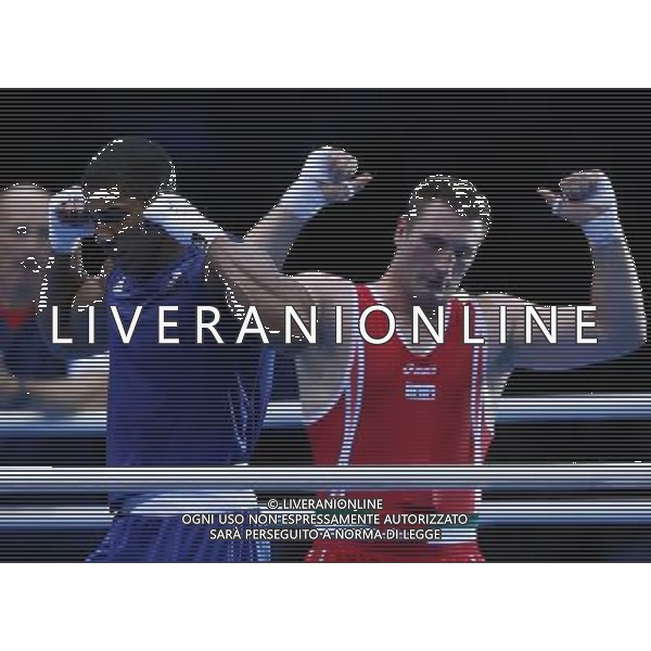 (120812) -- LONDON, Aug. 12, 2012 () -- Anthony Joshua of Britain (in blue) celebrates after defeating Roberto Cammarelle of Italy in men\'s boxing super heavy (+91kg) gold medal contest, at London 2012 Olympic Games in London, Britain, on August 12, 2012. Anthony Joshua of Britain won gold medal. (/Wang Shen) (nxl) ITALY ONLY - GIOCHI OLIMPICI, OLIMPIADI LONDRA 2012