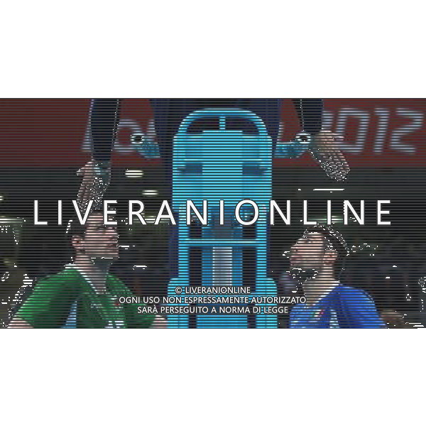 (120812) -- LONDON, Aug. 12, 2012 () -- Players argur with the referee during men\'s volleyball bronze medal match between Italy and Bulgaria, at London 2012 Olympic Games in London, Britain, on August 12, 2012. Italy won 3-1. (/Wang Lili) (nxl) ITALY ONLY - GIOCHI OLIMPICI, OLIMPIADI LONDRA 2012